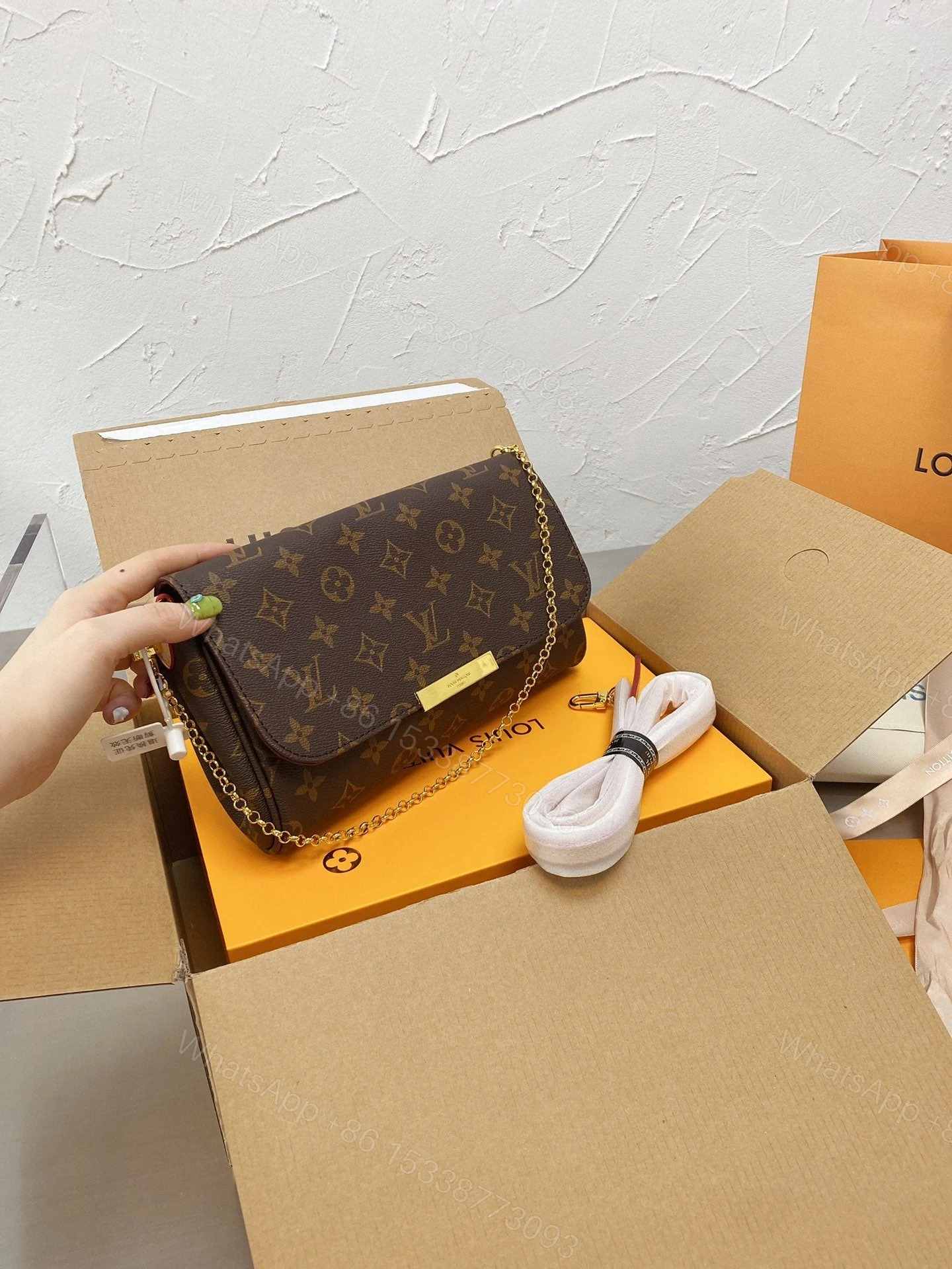 View 4 of Louis Vuitton Monogram Favorite MM