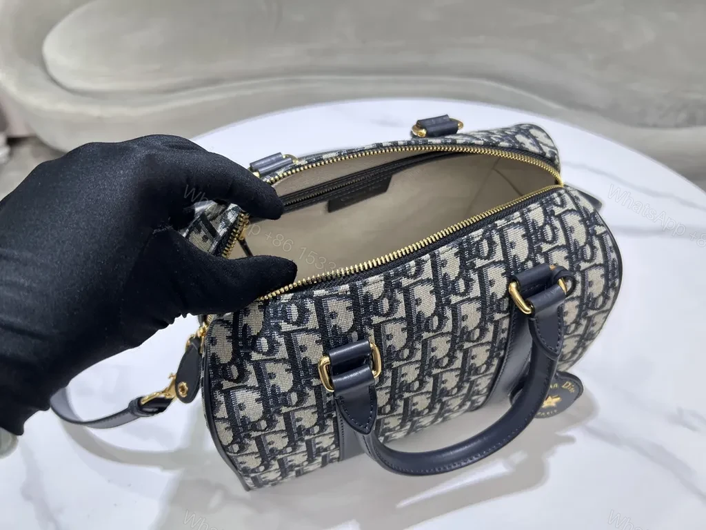 View 7 of Compact Luxury Satchel: Monogram Pattern, Gold Hardware, Crossbody/Top-Handle