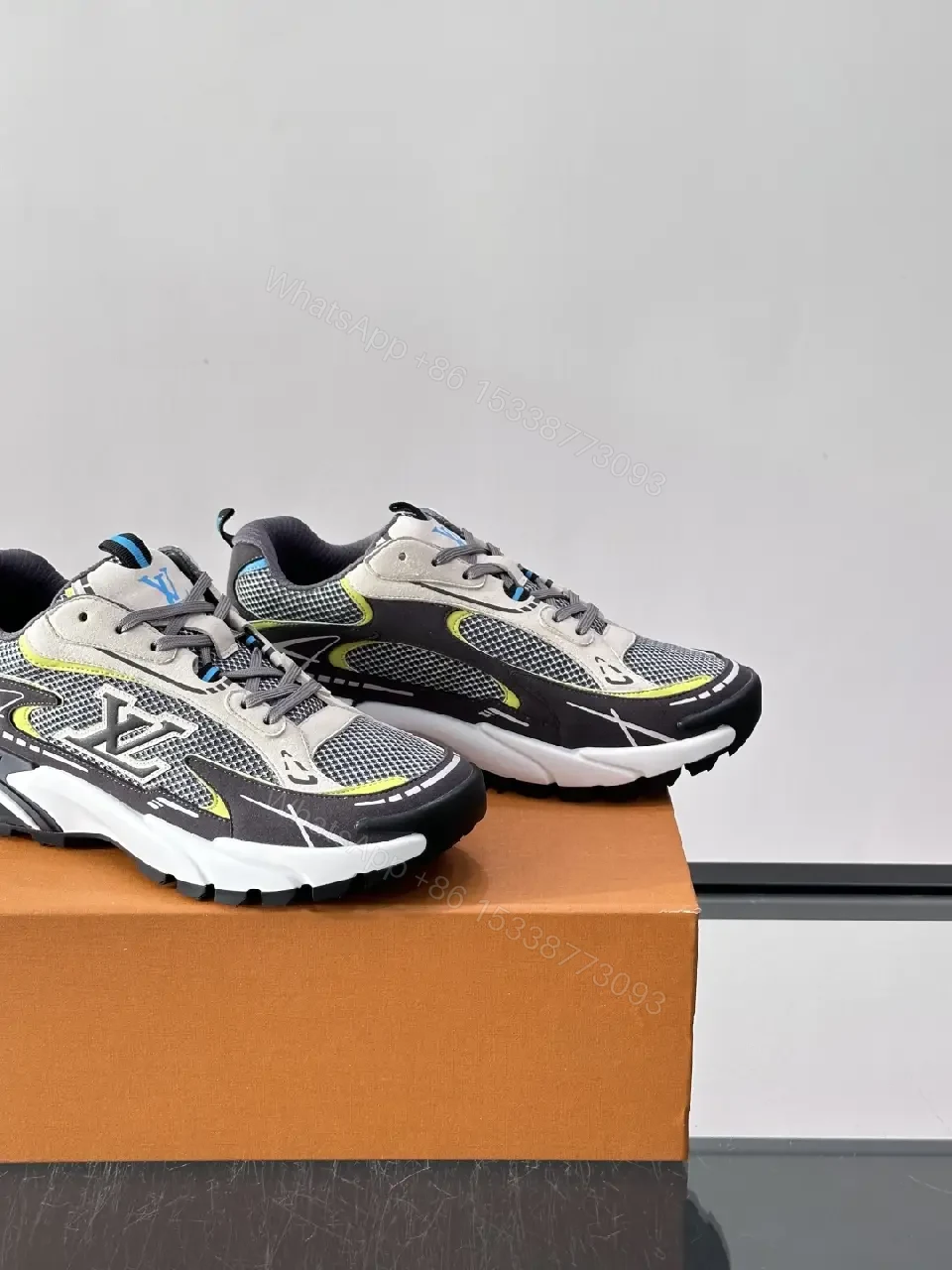 View 2 of Gray/Black Mesh Leather Sneaker with LV Accents, Sporty Chunky Style