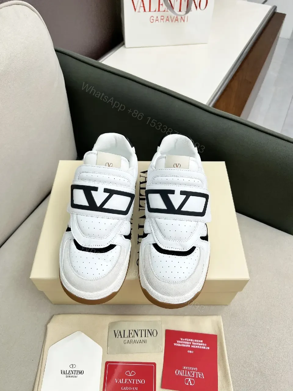 White Leather High-Top Sneakers with Geometric Hardware — view 1