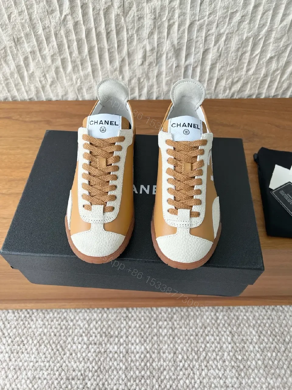 View 2 of Brown Leather High-Top Sneaker with Contrast Texture and Logo