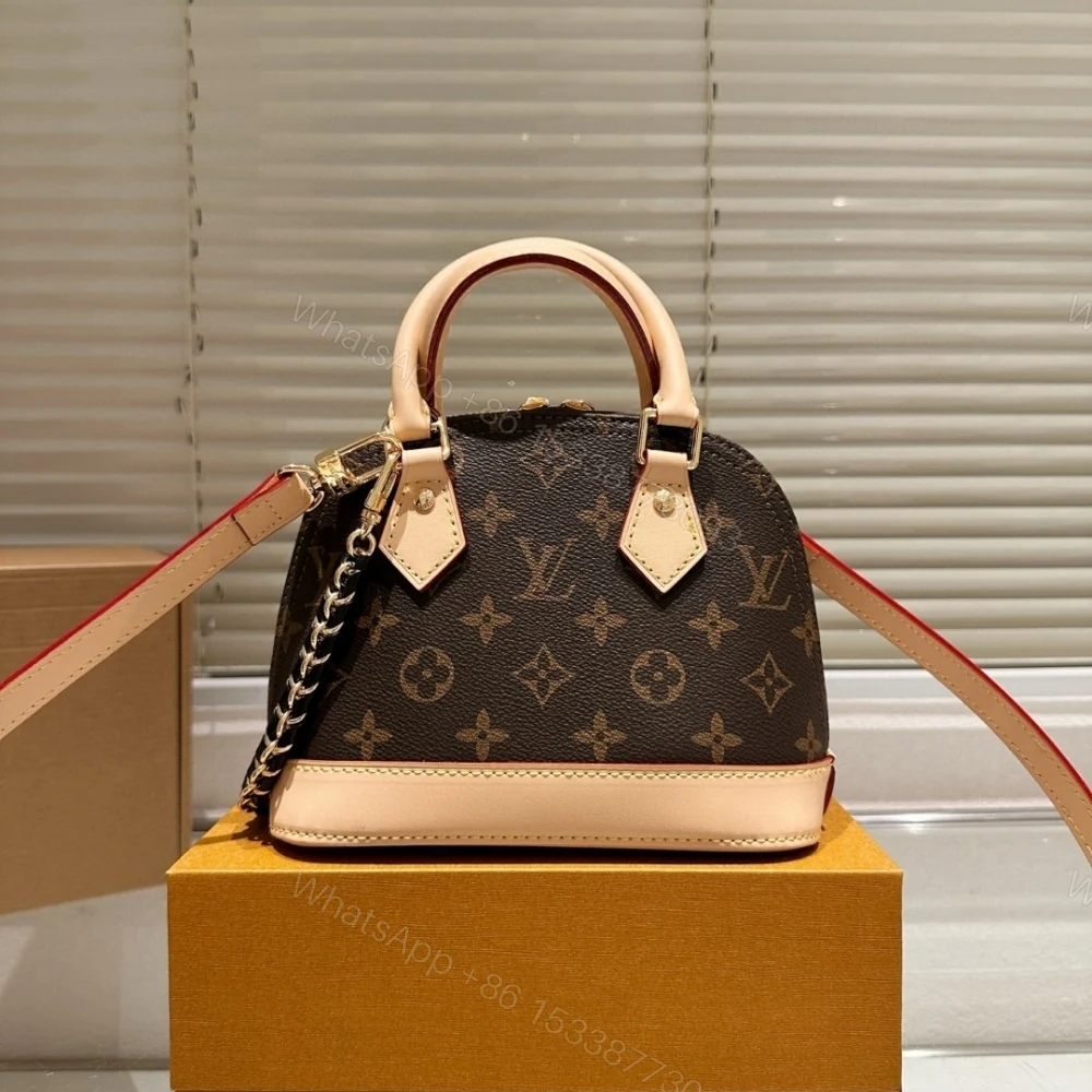 View 4 of Louis Vuitton Alma Mini LV And I Monogram Brown 25Cm K00016