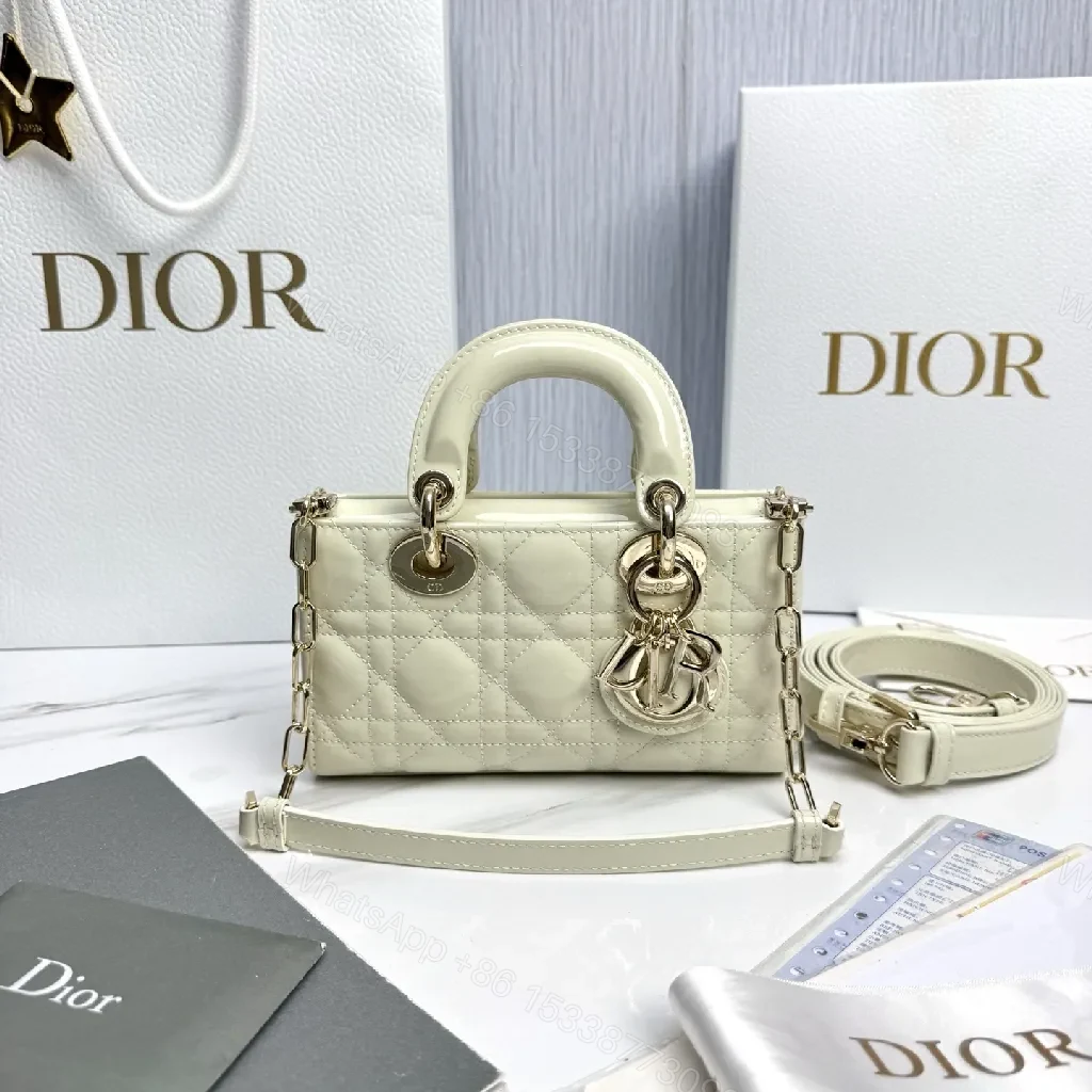 Ivory Faux-Leather Mini Bag: Quilted, Gold-Accent Luxury — view 1