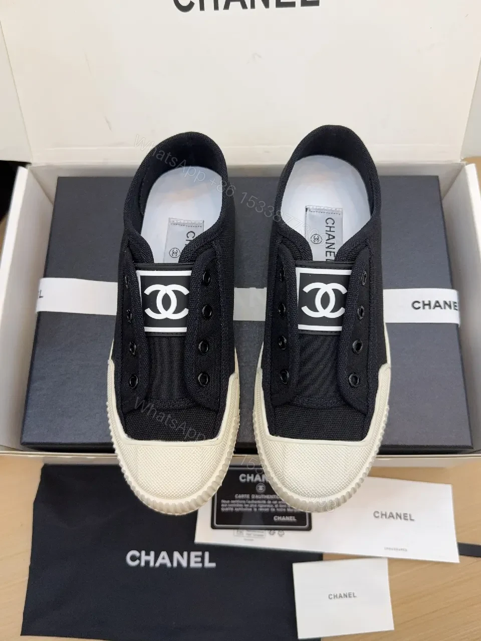View 8 of Minimalist Black Canvas Sneakers with Logo Strap