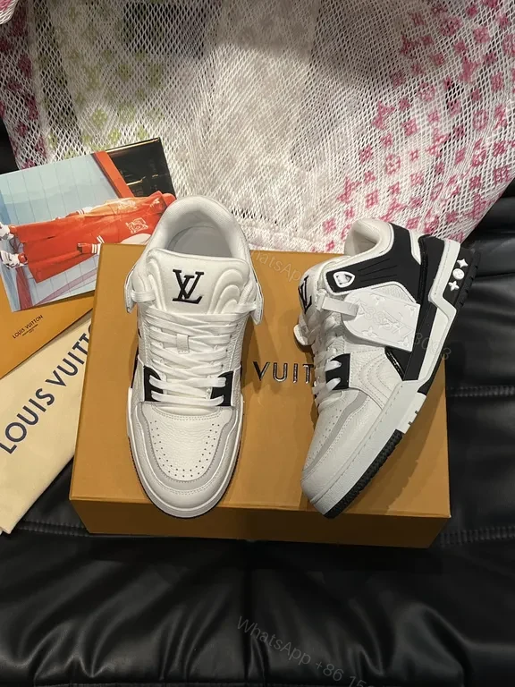 View 9 of White Leather High-Top Sneakers with LV Branding and Visible Hardware
