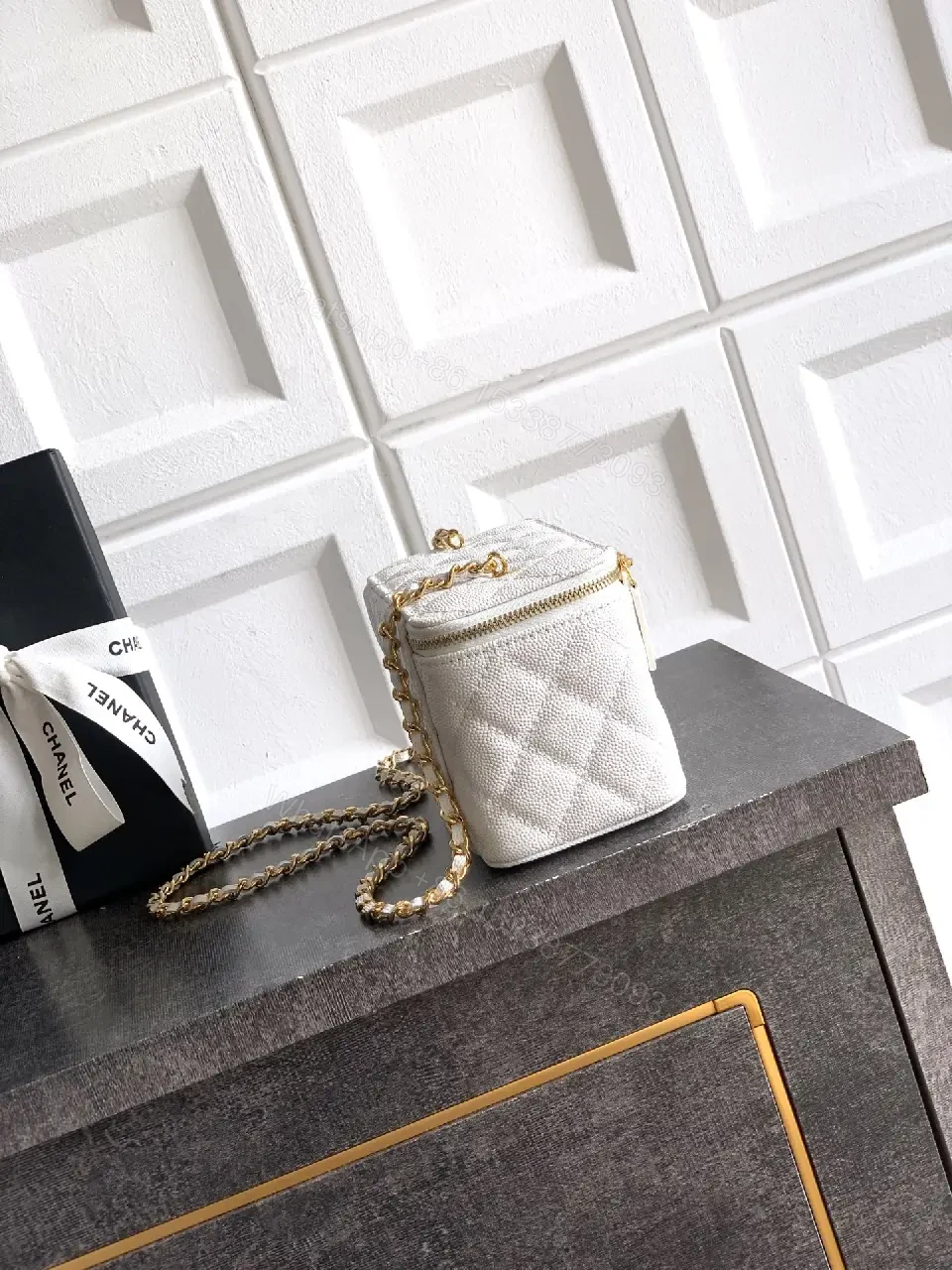 View 5 of white quilted leather bag with chain strap for everyday luxury