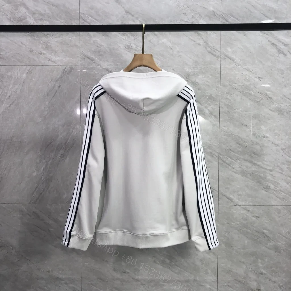 View 8 of Minimalist Sporty Hoodie with Striped Details in Knit Comfort