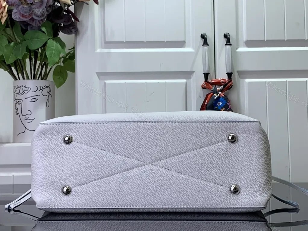 View 9 of Pebbled Leather Tote: LV Emblem, Structured, Spacious Carrier