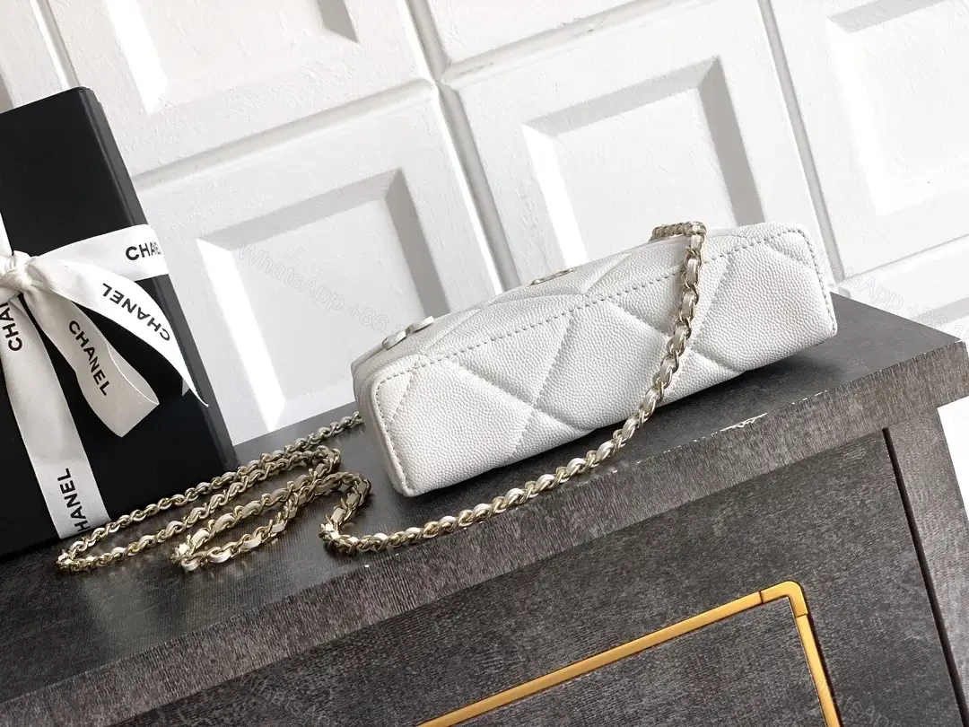 View 8 of White Quilted Mini Bag with Gold Hardware, Sleek Chic Carryall