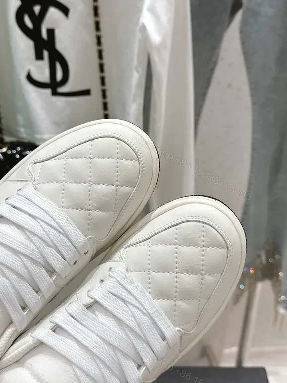 View 3 of White Quilted Leather Sneakers with Emblem - Elevated Comfort