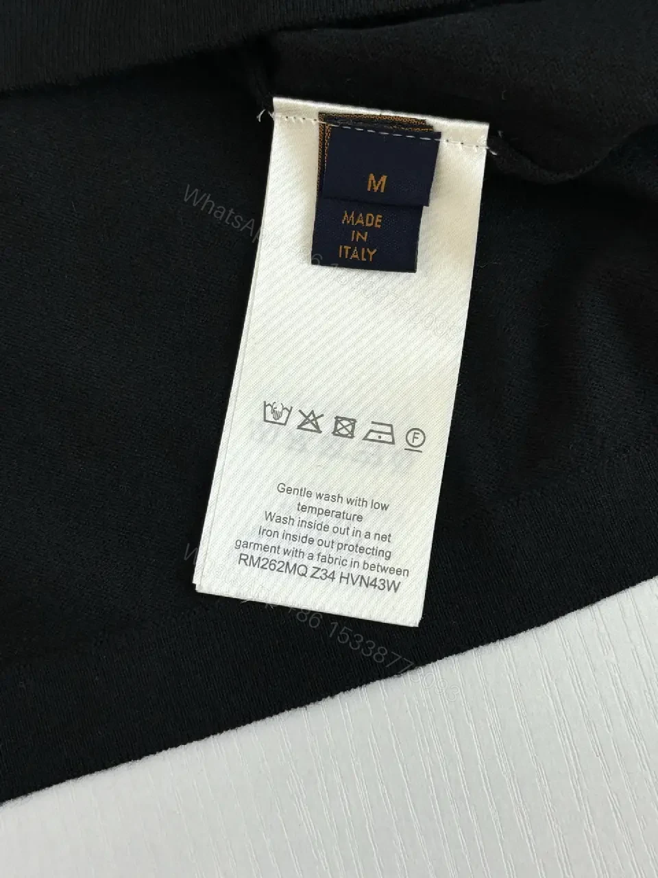 View 8 of Premium Polo Shirt in Classic Black: Subtle LV Touch