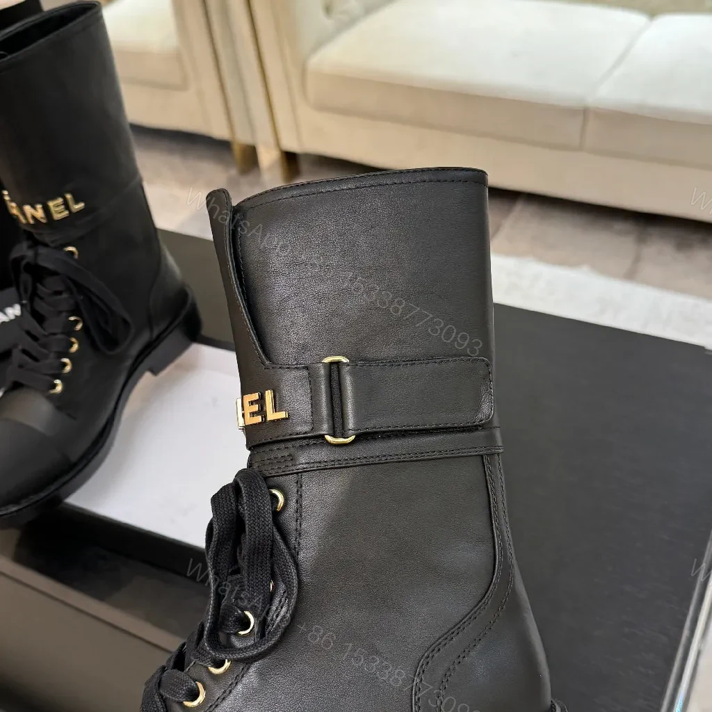 View 4 of Chic Black Combat Boots with Gold Detailing - High-Top Style