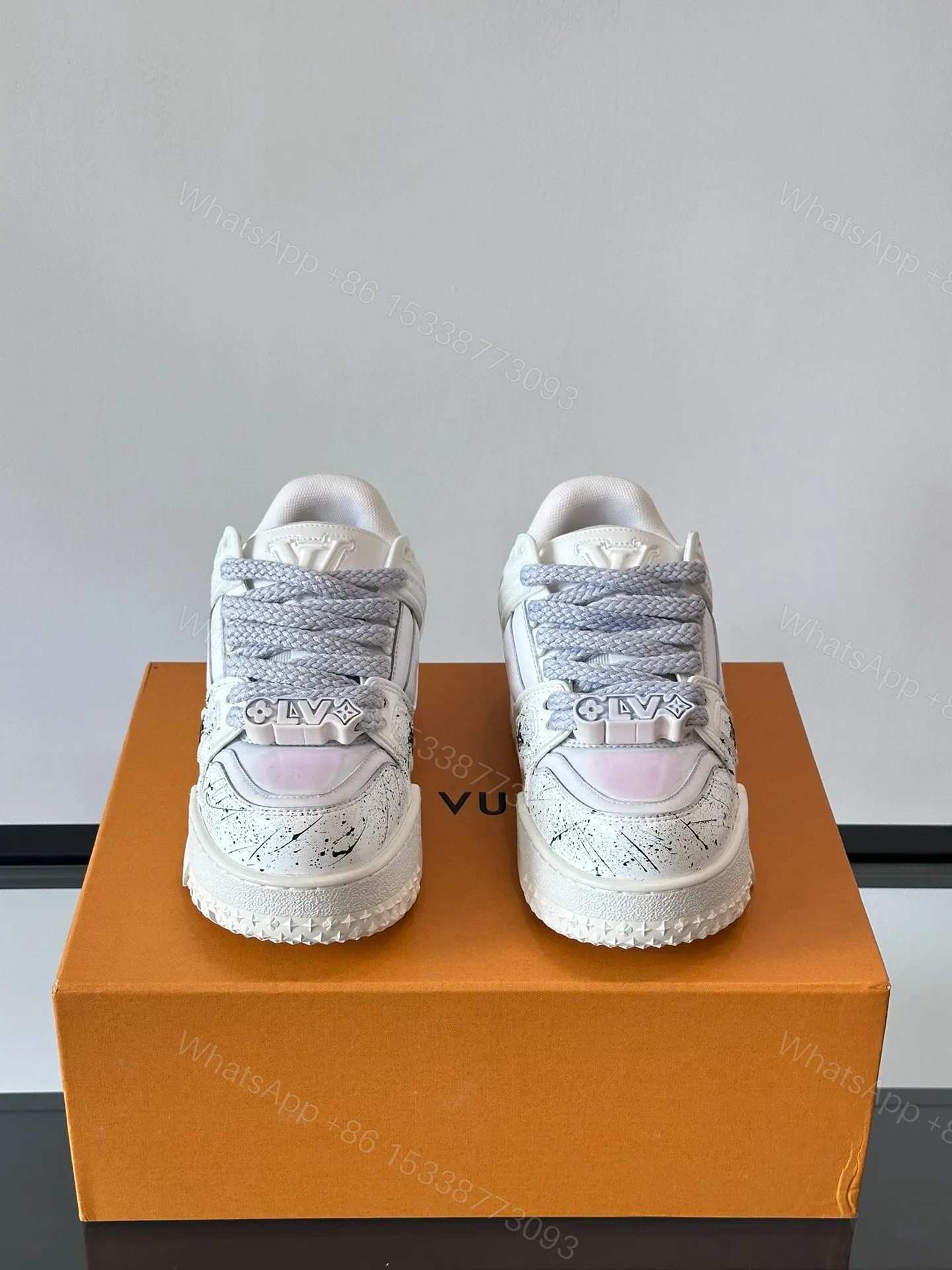 View 2 of LV Men White Leather Sneakers With Black Splatter