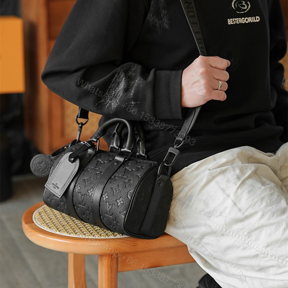 View 19 of 高仿LV*Keepall25系列M20900壓紋牛皮男士單肩包黑色免檢版