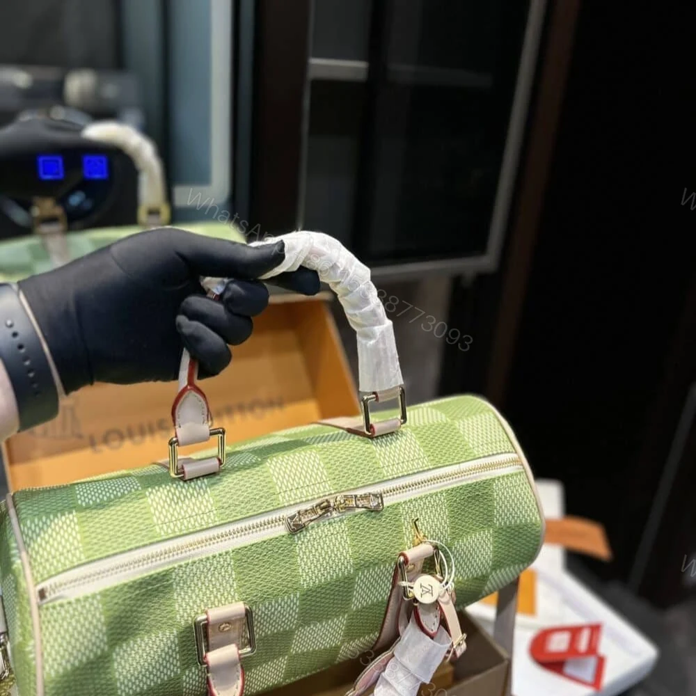 View 7 of Louis Vuitton Keepall Bandoulière Damier Canvas Green 35Cm N40671