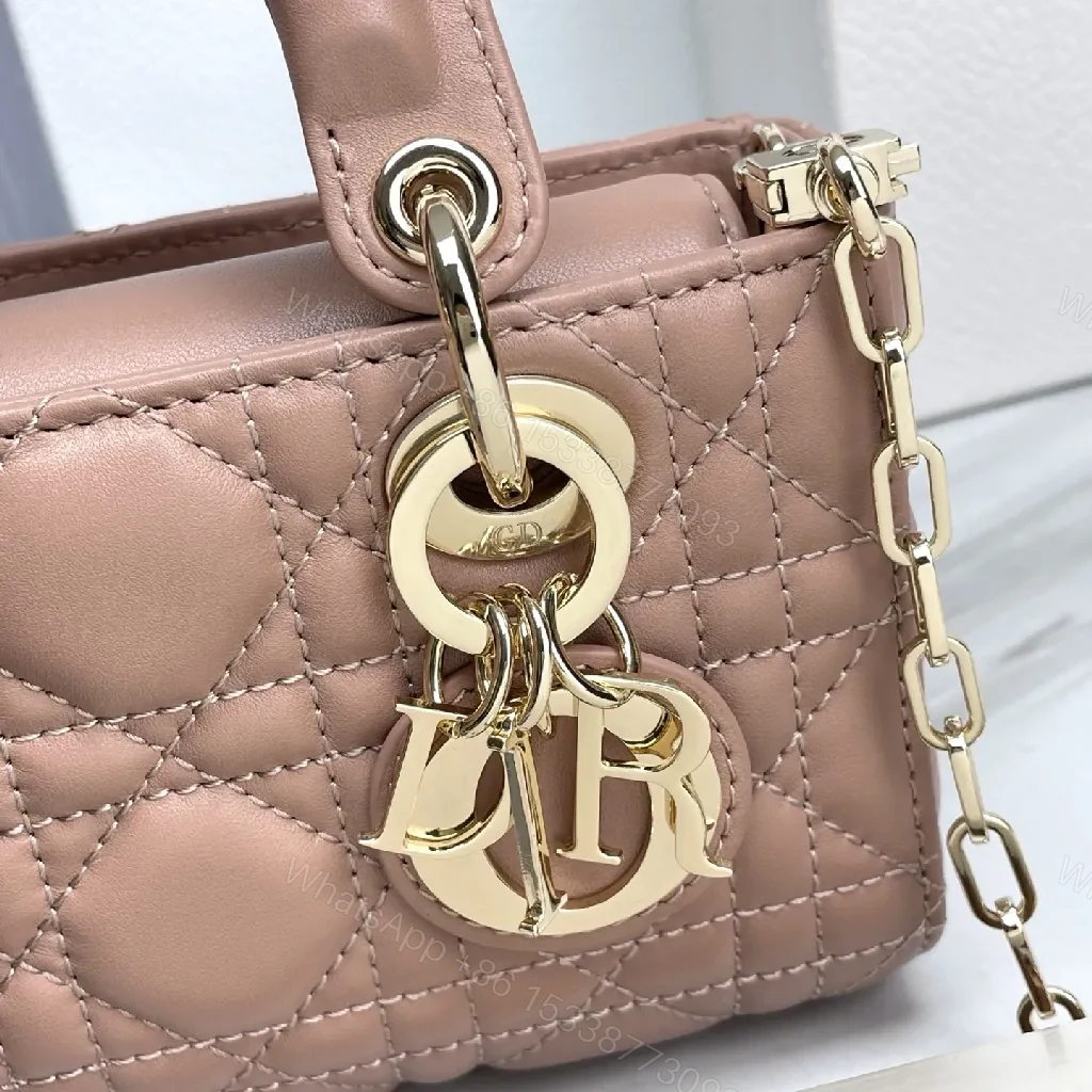 View 4 of Soft Pink Quilted Mini Crossbody with Gold Charms - Compact Luxury Bag