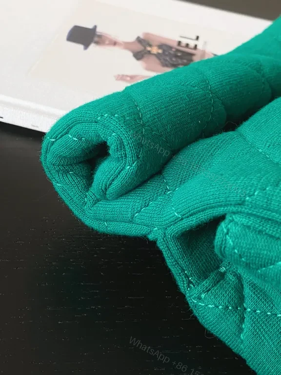 View 3 of Emerald Quilted Purse: Gold-Closure, Structured Luxe Bag