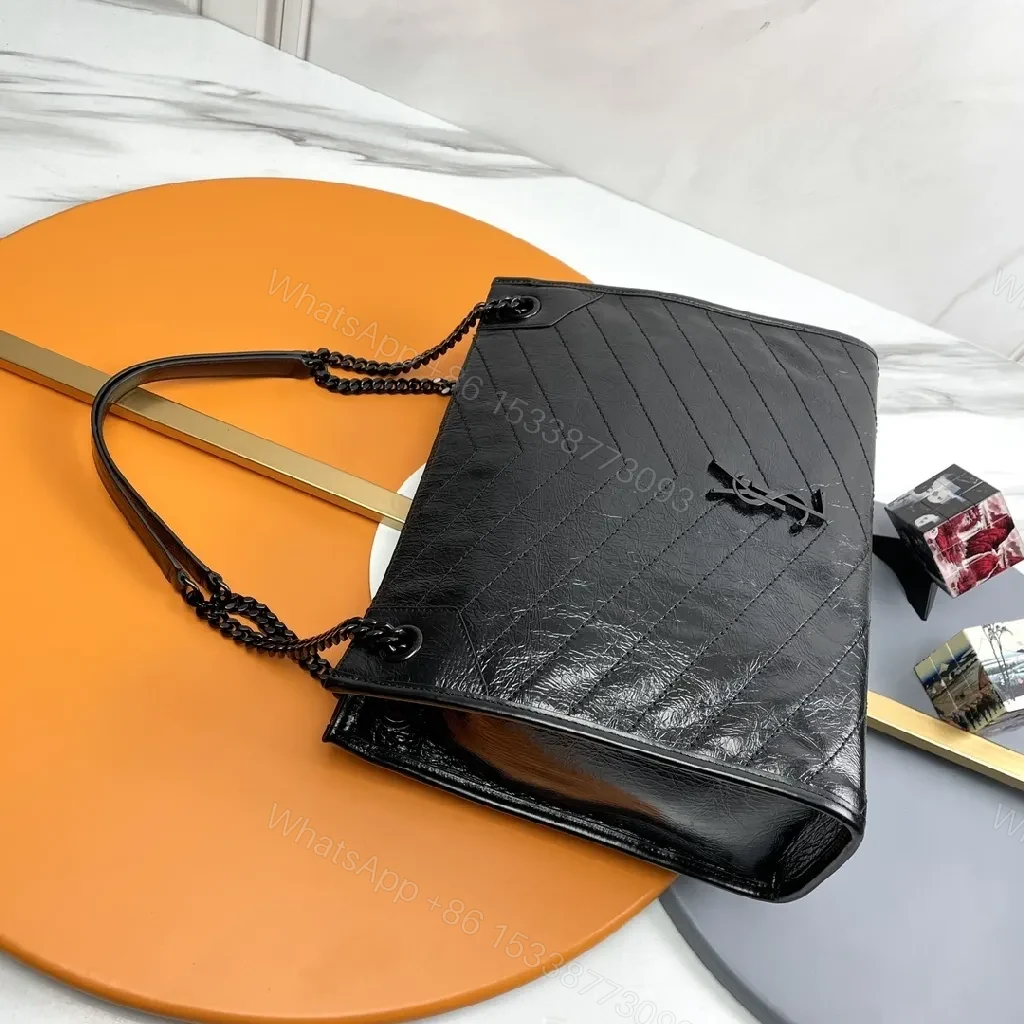 View 9 of Matte Black Quilted Leather Shoulder Bag: Chic Minimalist Style