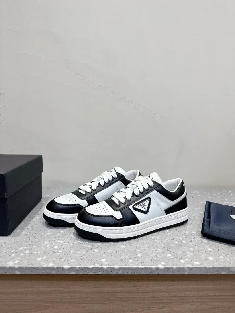 Monochrome Leather Sneaker with Subtle Designer Detailing — view 1
