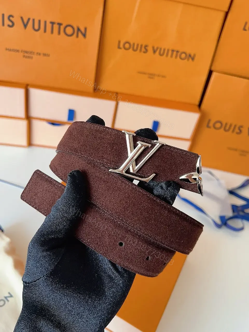 View 5 of Textured Leather Belt with Gold LV Buckle - Luxury Accessory Belt