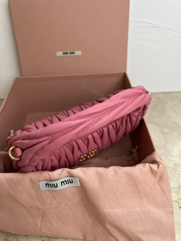 View 8 of Pink Quilted Miu Miu Mini Bag â€“ Luxury Everyday Chic
