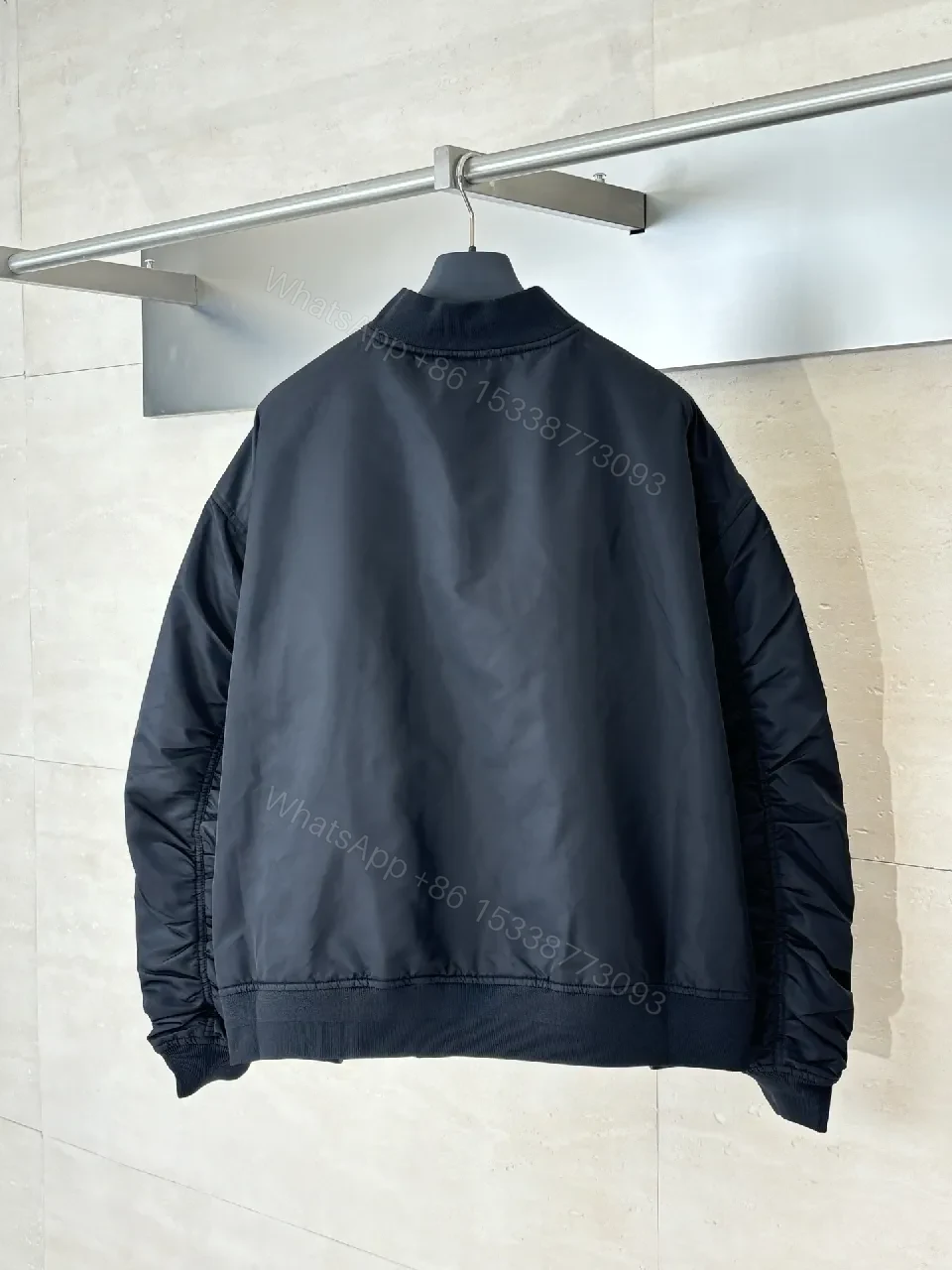 View 2 of Bold Black Logo Varsity Jacket | Luxe Streetwear Outerwear