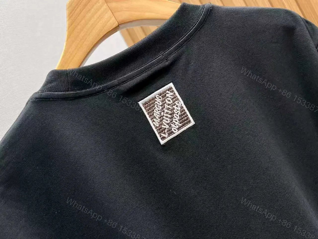 View 10 of White Cotton Crewneck Tee with LV-Inspired Embroidery, Casual Luxe Tee