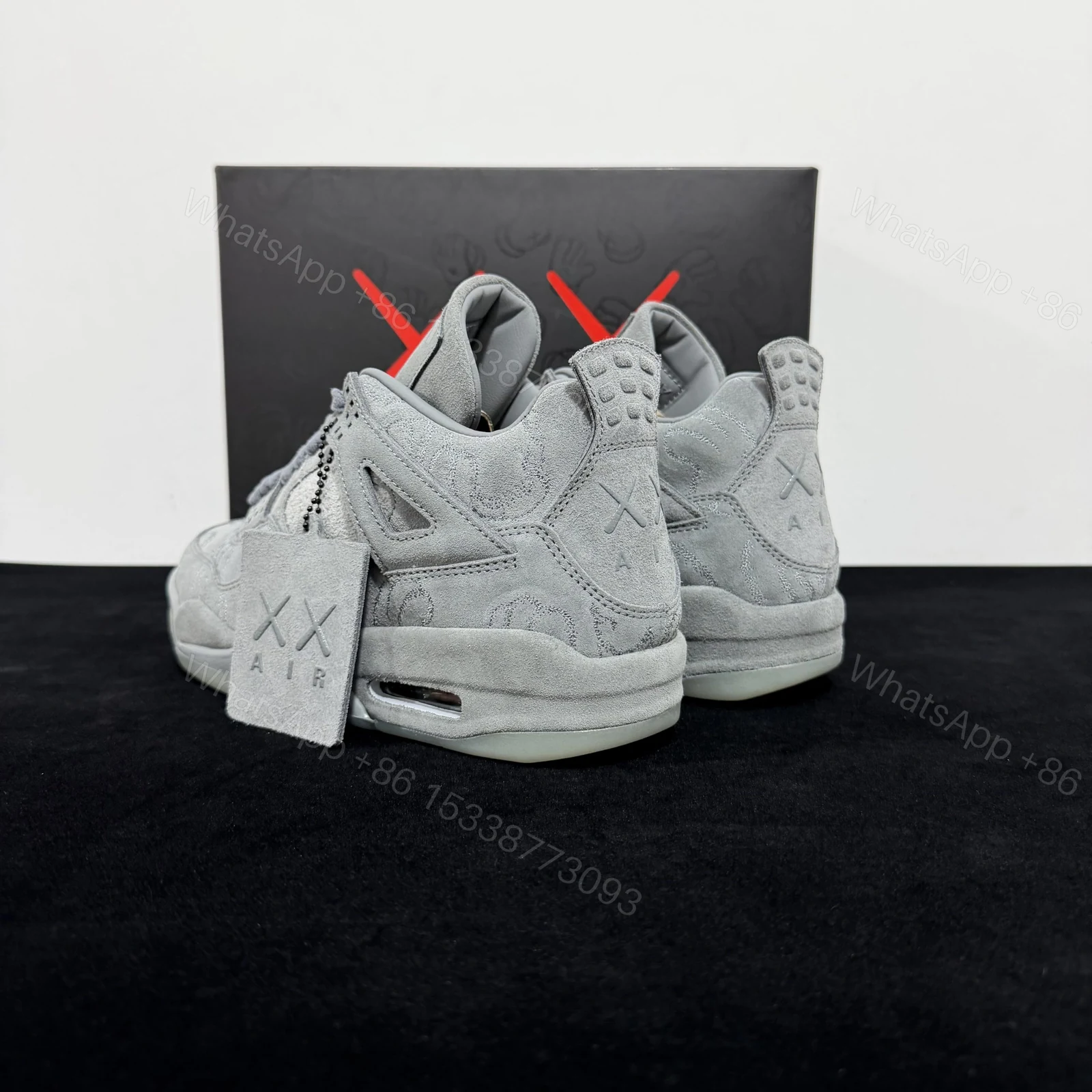 View 5 of Air Jordan 4 Retro KAWS Grey Reps