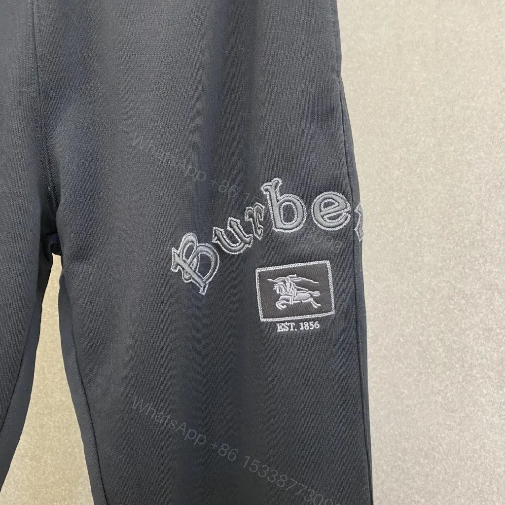 View 2 of Lightweight Track Pants with Subtle Luxury Detailing