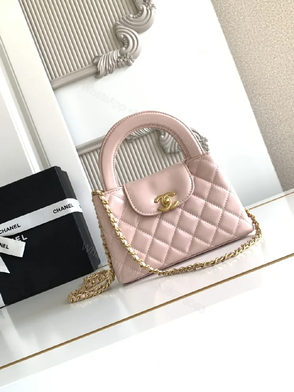 View 7 of Soft Pink Leather Quilted Mini Bag with Gold Hardware