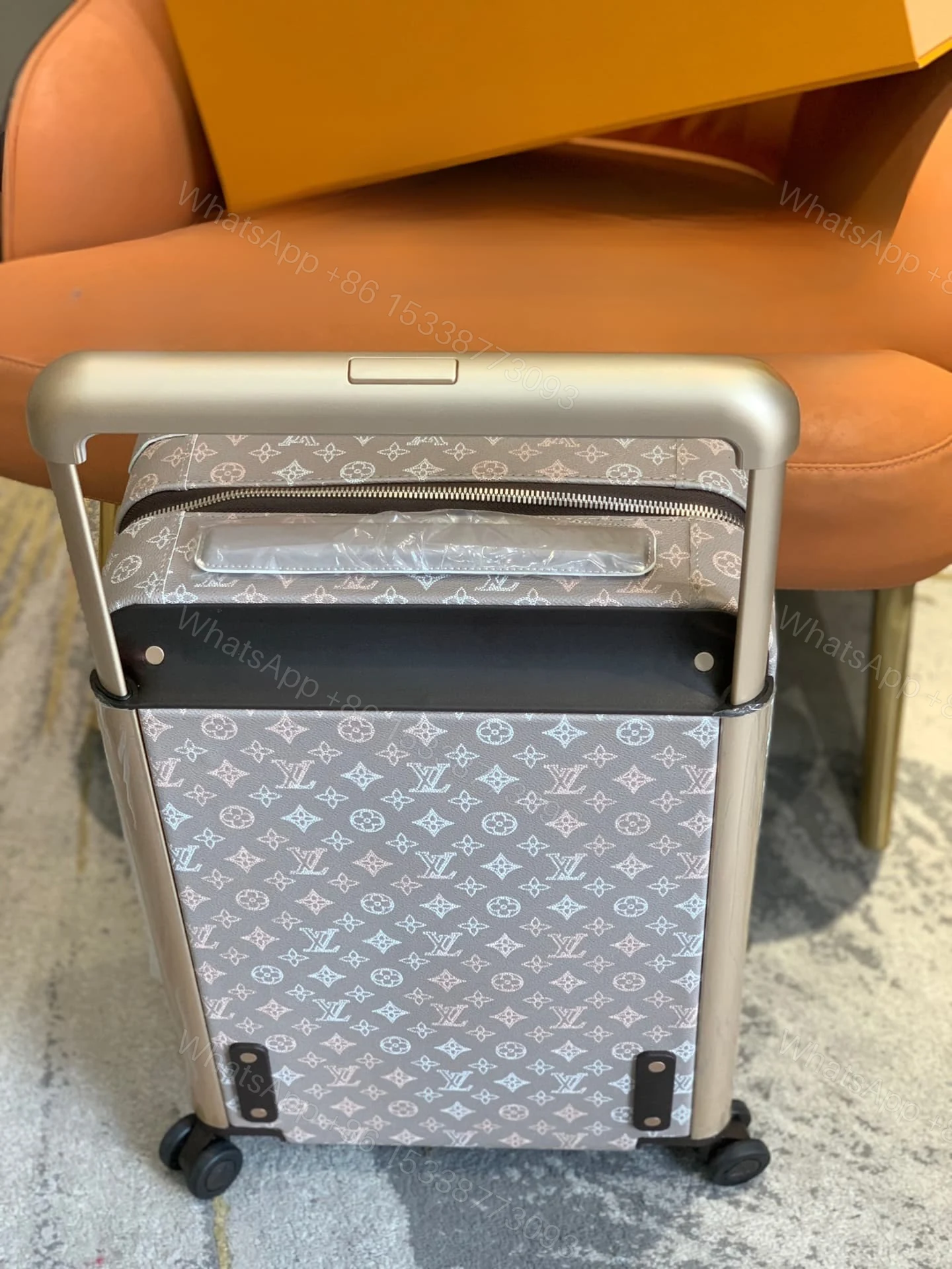 View 7 of Louis Vuitton Horizon 55 Suitcase Mahina Perforated Calfskin Leather Gray 55Cm M10282