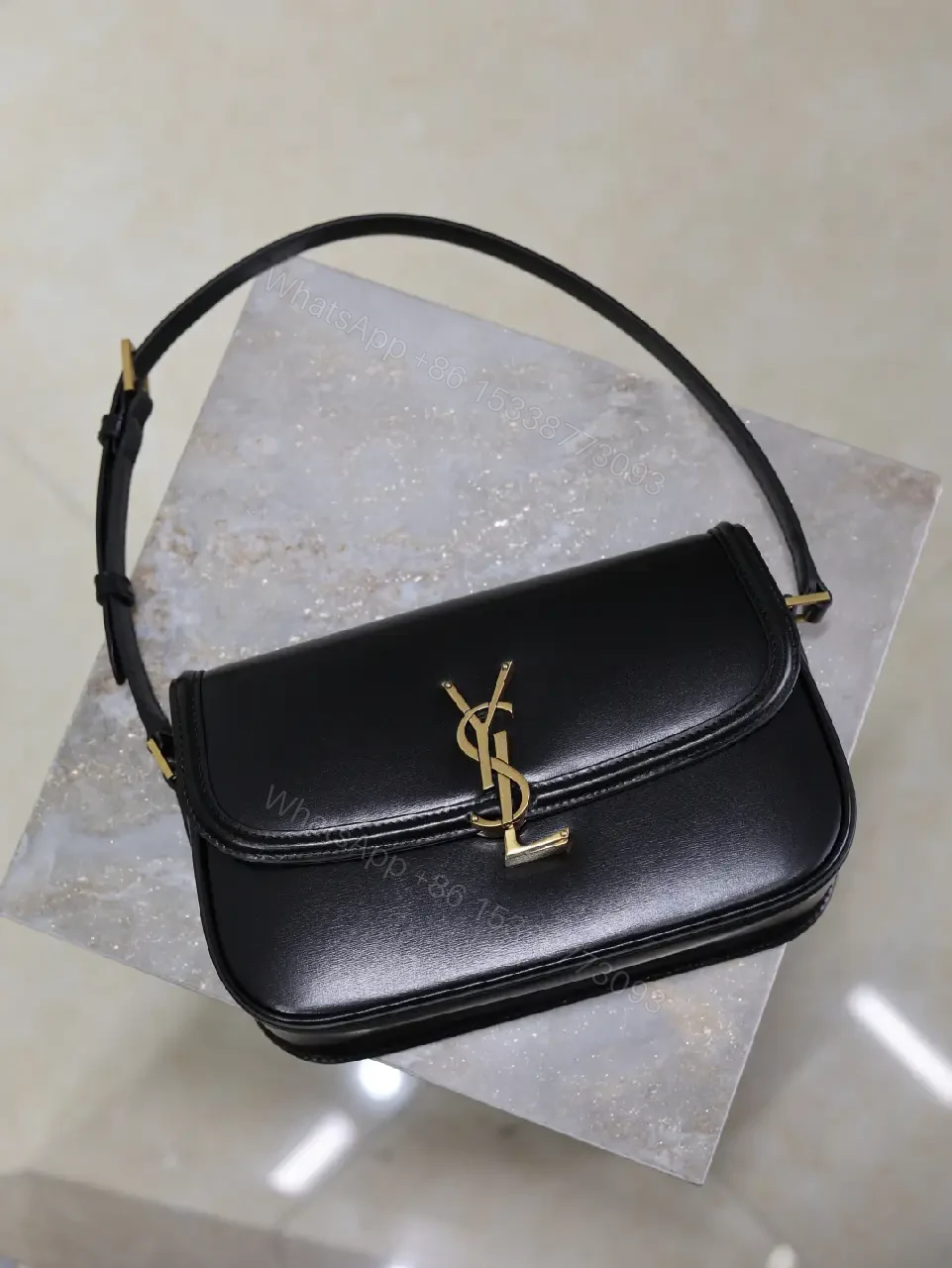 View 8 of Compact Black Leather Shoulder Bag with Gold Hardware