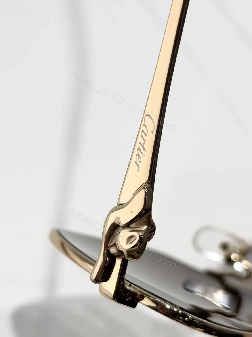 View 3 of Lux Titanium-Frame Sunglasses with Cartier Detailing