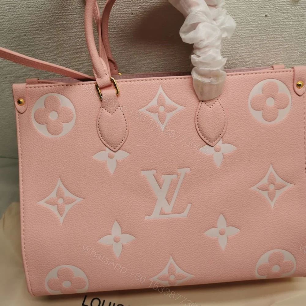 View 4 of Louis Vuitton Onthego MM Monogram Empreinte Leather Trianon Pink 33Cm M46286