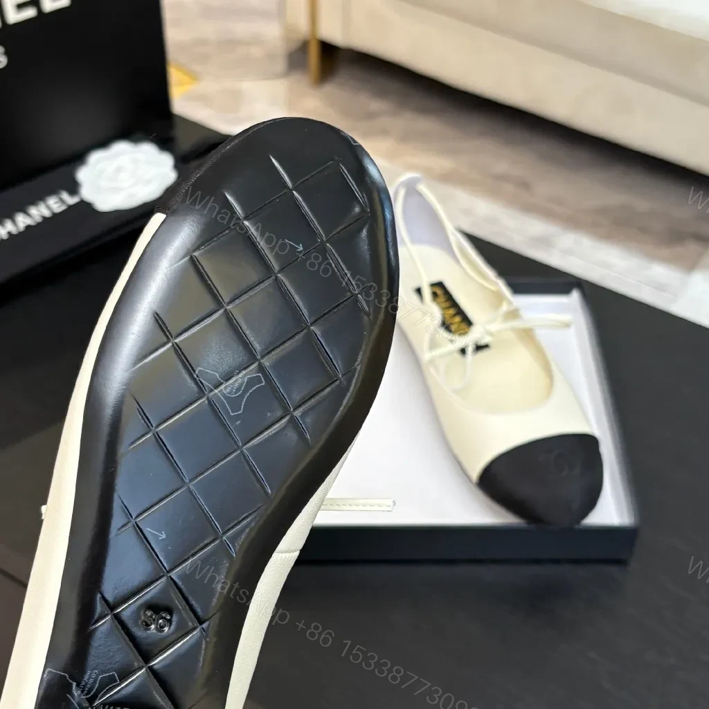 View 6 of Ivory Leather Ballet Flats with Black Cap Toe, Lace-Up, Elegant