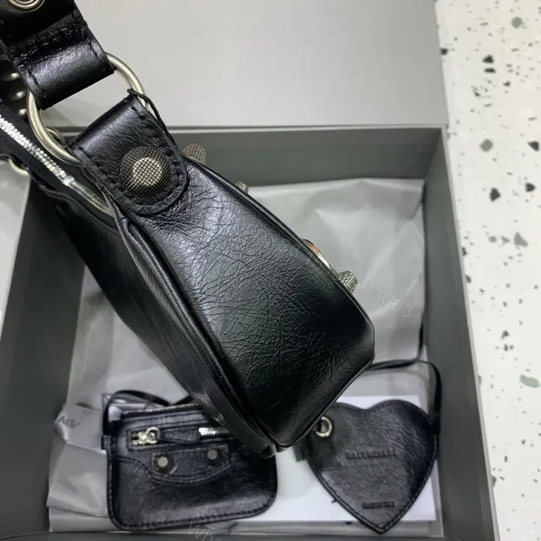 View 6 of Sculpted Black Leather Messenger Bag with Brass Accents