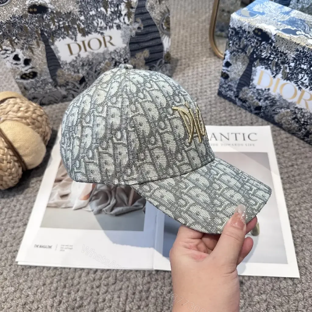 View 2 of Gray Monogram Textured Cap with Gold Dior Embellishment