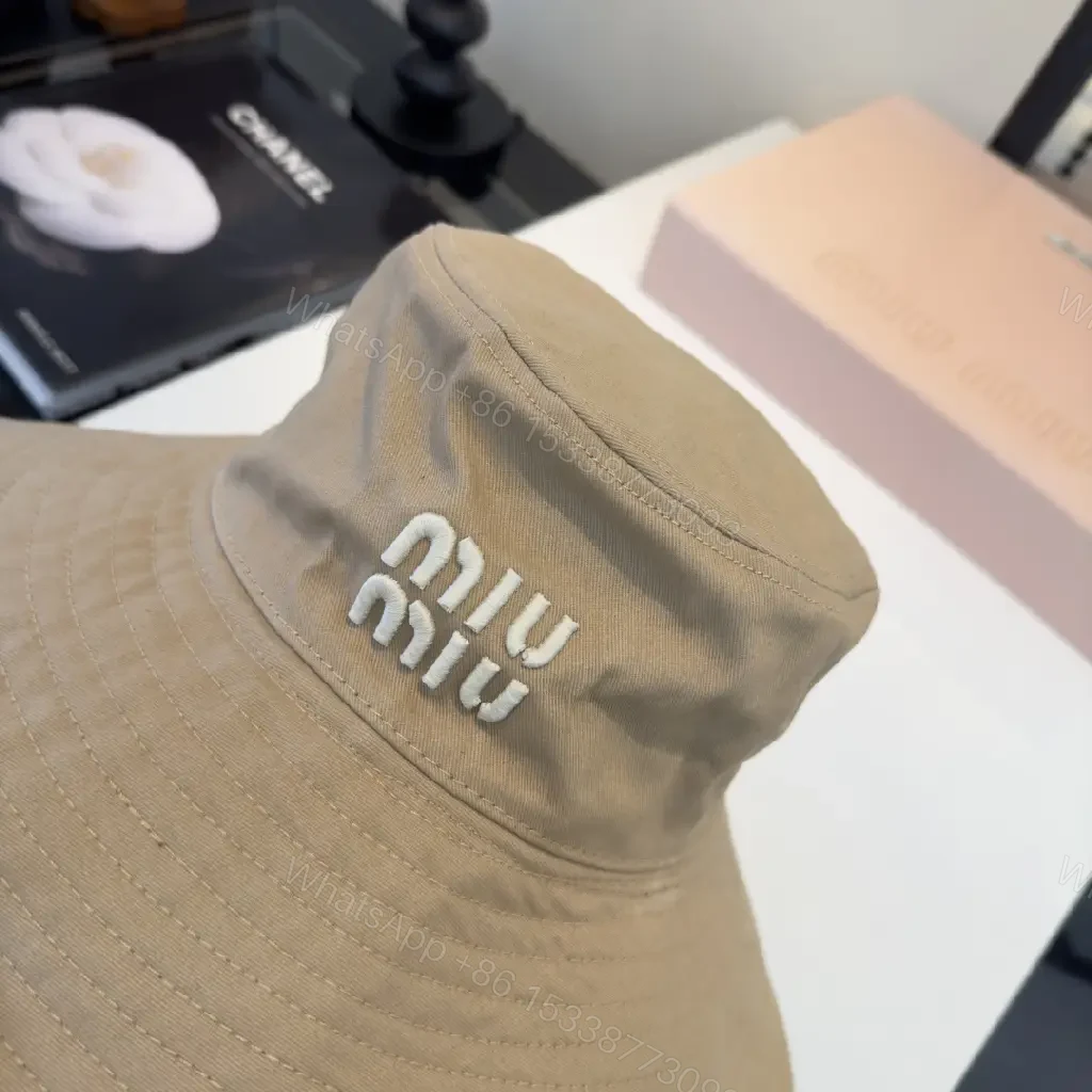 View 9 of Textured Beige Canvas Bucket Hat with Logo Detail
