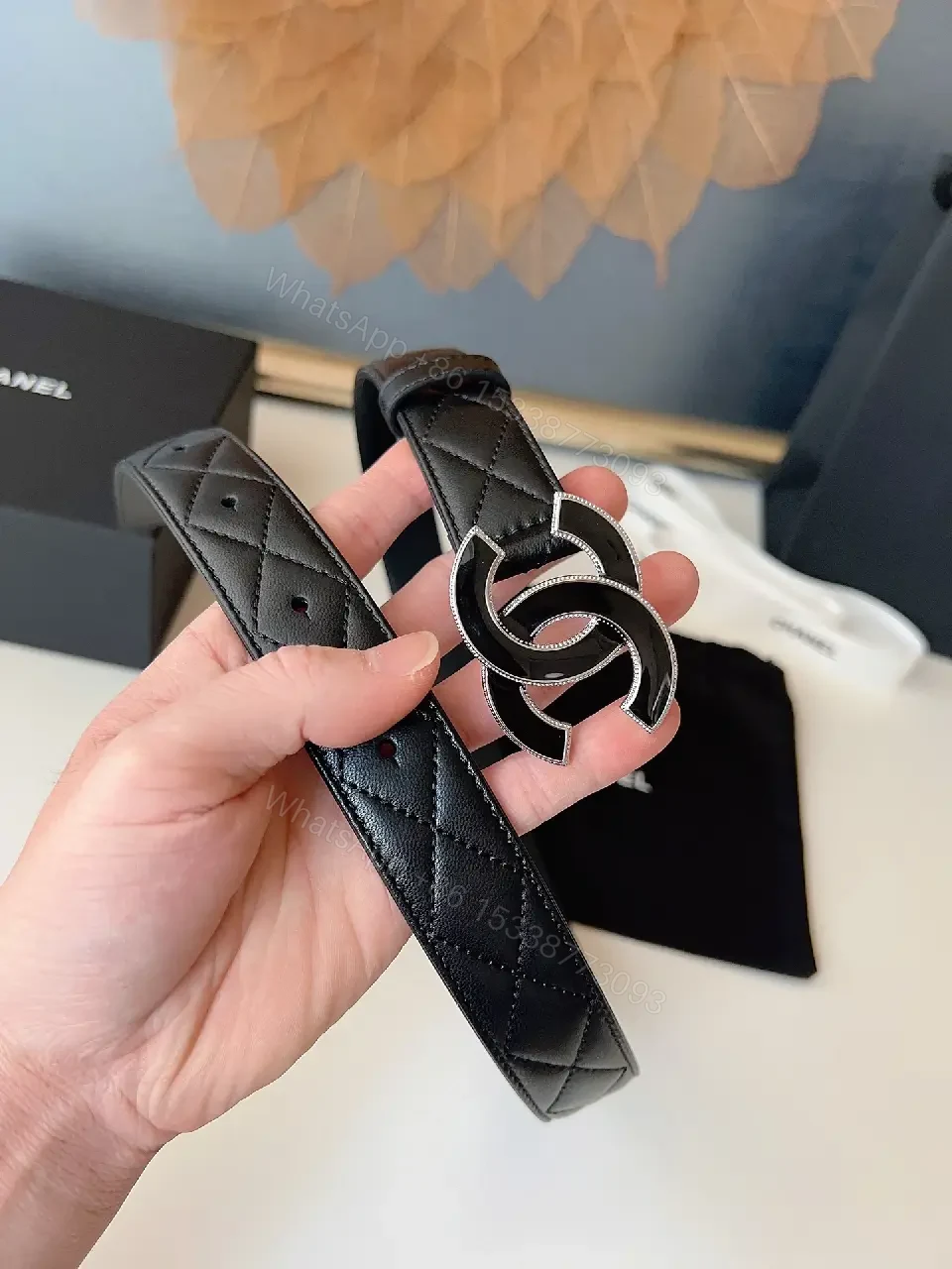 View 3 of Quilted Leather Belt with Signature Buckle - Black - Slim