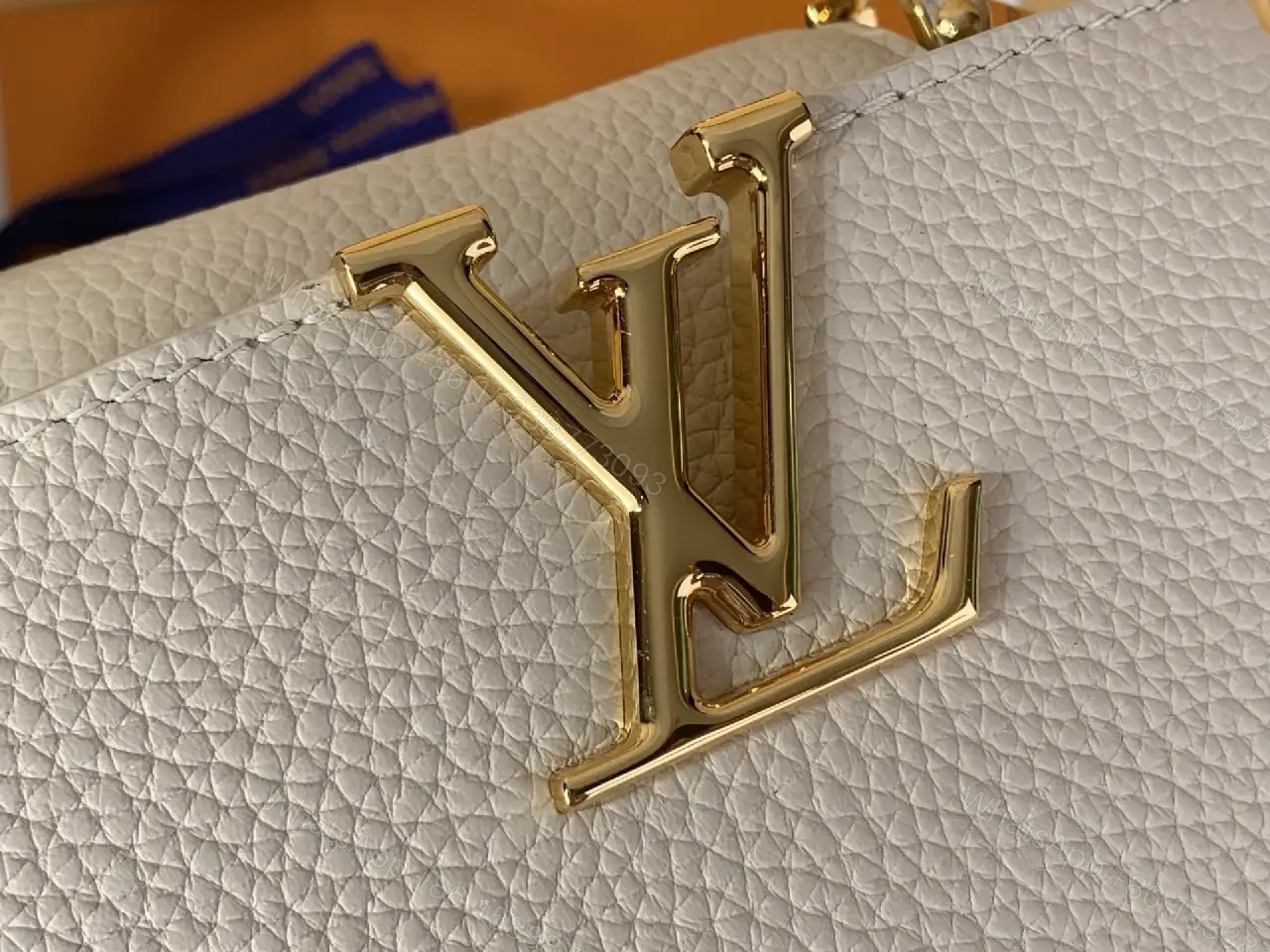 View 13 of Chic Textured Leather Mini Bag with Gold Emblem