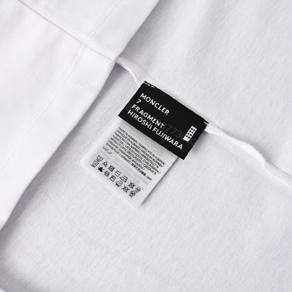 View 4 of Lightweight White Tee with Subtle Moncler Logo, Modern, Ultra-Comfortable