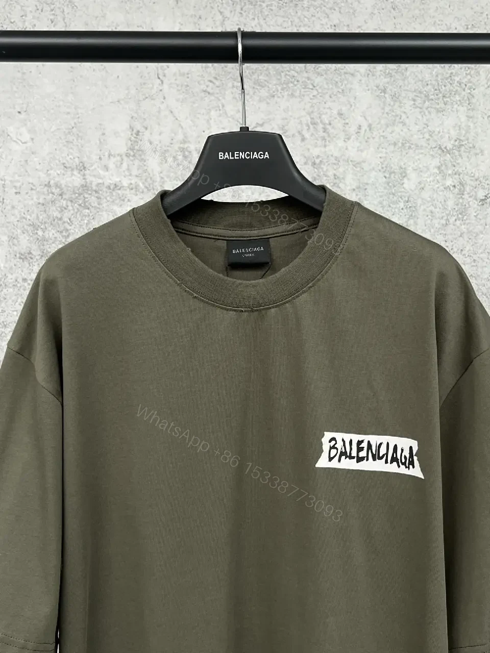 View 7 of Olive Cotton Patch Tee: Relaxed, Street-Ready Comfort