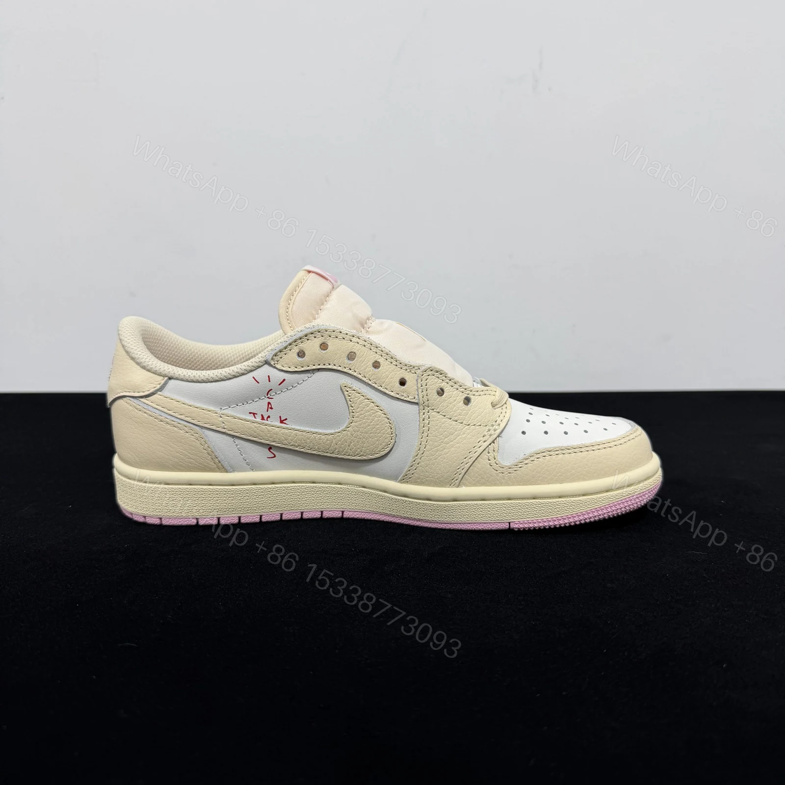 View 2 of Travis Scott x Air Jordan 1 Low Shy Pink Sail