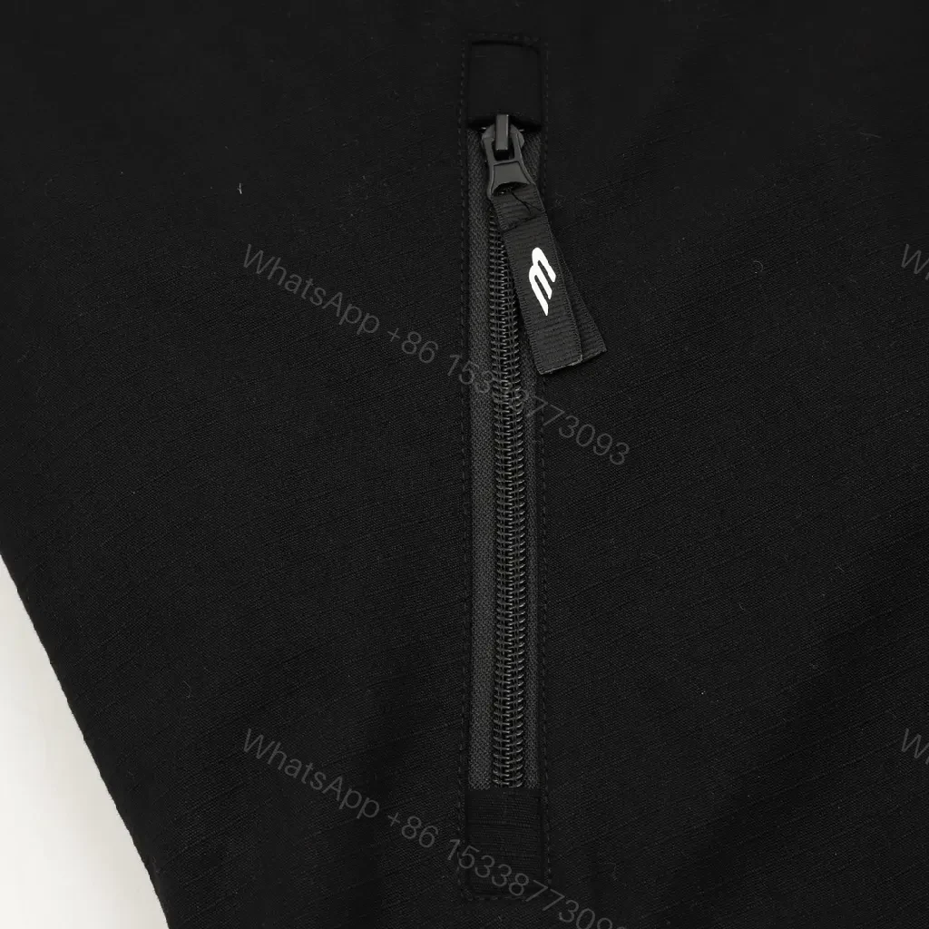 View 2 of Black Puffer Hoodie — Minimalist Luxury, Water-Repellent, Zip Pockets
