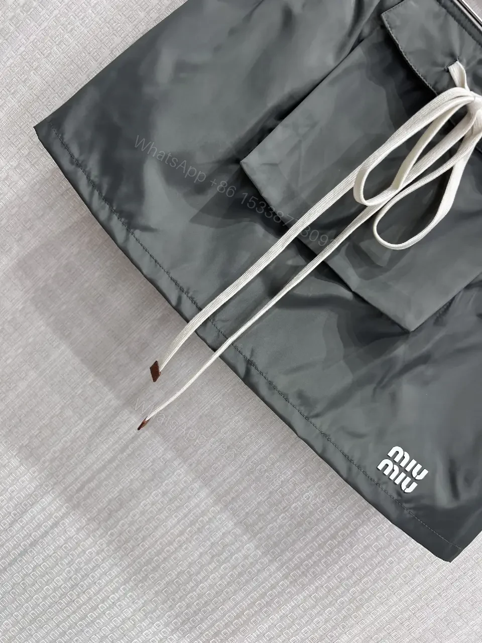 View 5 of Gray Nylon Mini Skirt Drawstring Waist Miu Miu Style Front Patch Pocket Skirt