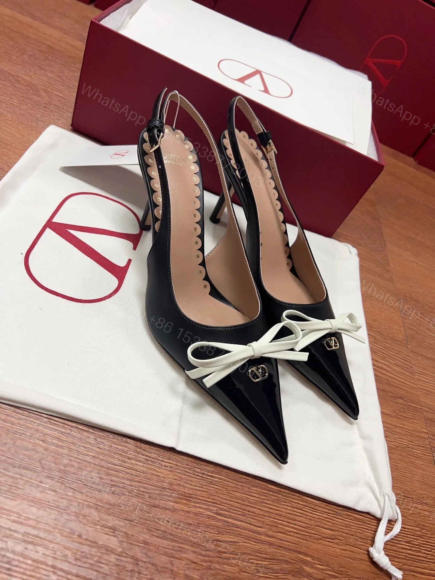 View 3 of Valentino Women Black Patent Leather Bow Slingback Pumps