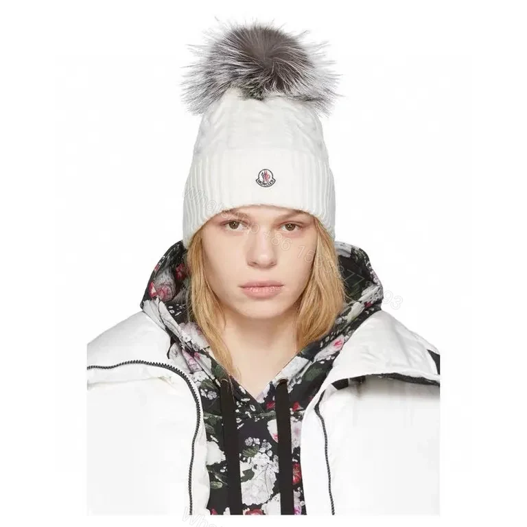 View 8 of Cozy Cable Knit Beanie with Fur Pom â€” Moncler Luxury Warmth