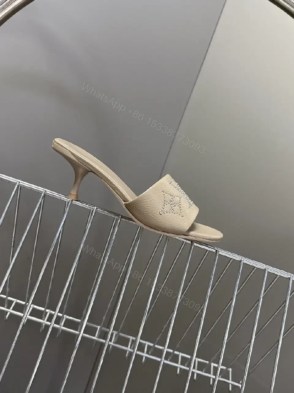 View 8 of Minimalist Taupe Leather Slides with Rhinestone Logo Embellishment