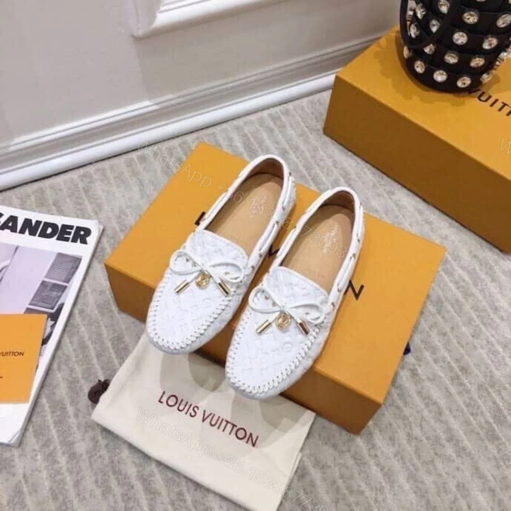 View 2 of LOUIS VUITTON WHITE MONOGRAM EMPREINTE LEATHER GLORIA LOAFERS