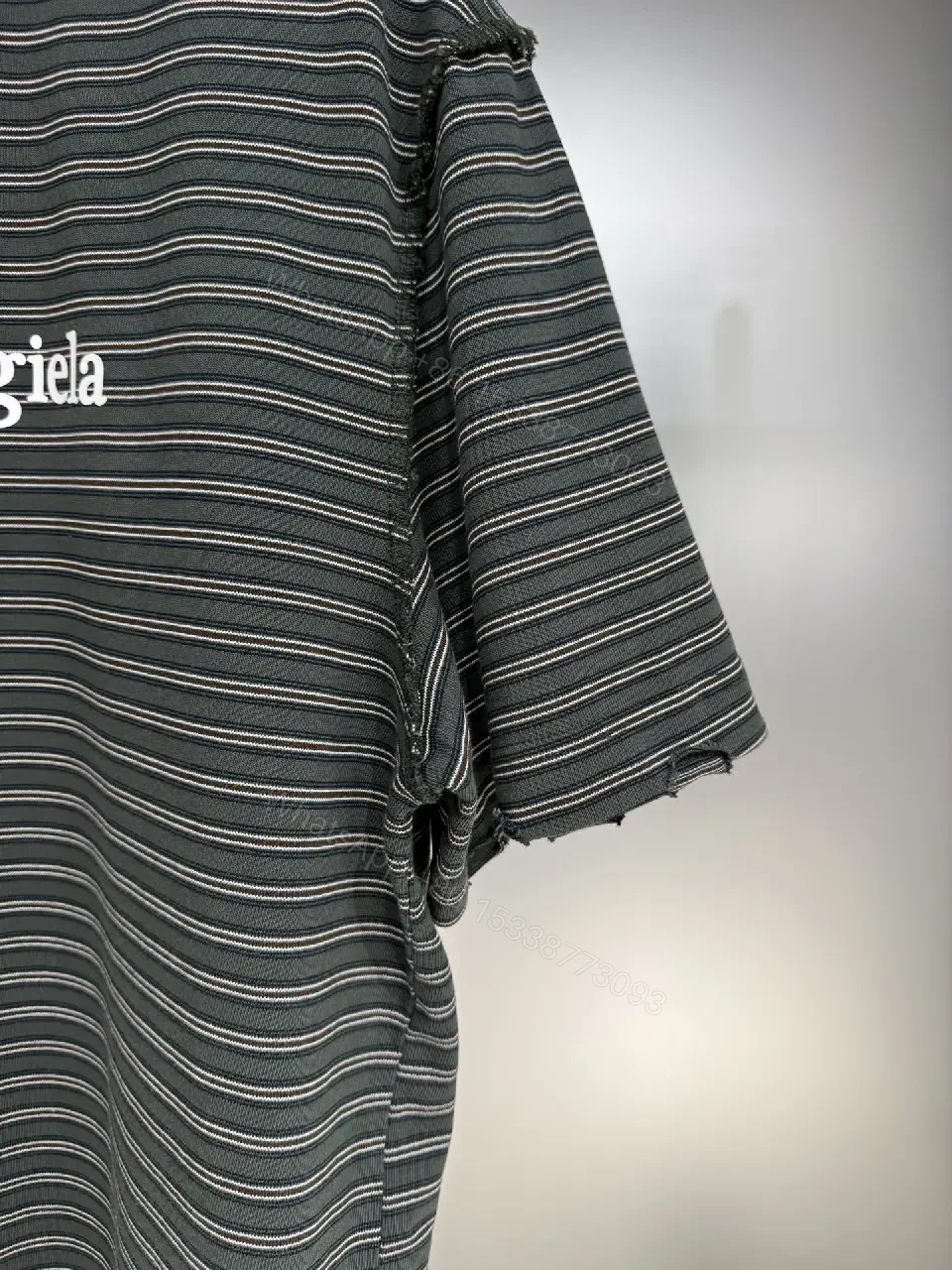 View 8 of Slim Stripe Polo Top - Soft Knit, Logo Accent, Modern Chic